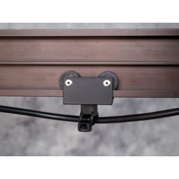 Каретка под сетевой кабель на четырех роликах